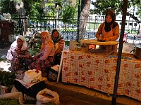 Tire  One lady making gözleme while others sit