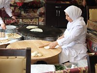 Istanbul - Sultanahmet  Lady making gözleme (stuffed crèpes)