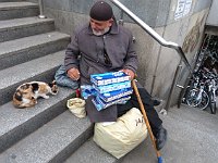 Promenades in Istanbul  At the Eminönü tram station, this gentleman sold tissues (we bought some) and nourished cats.