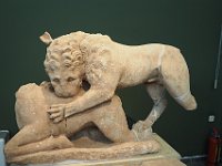 Statue of a lion killing and eating a deer.  gr17 092013140 k