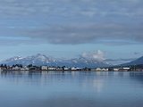 Pretty Akureyri, on the Eyjafjörður, the longest fjord in Iceland. The picture is looking along the length of the fjord, the town being on a thumb of landing sticking out into it.