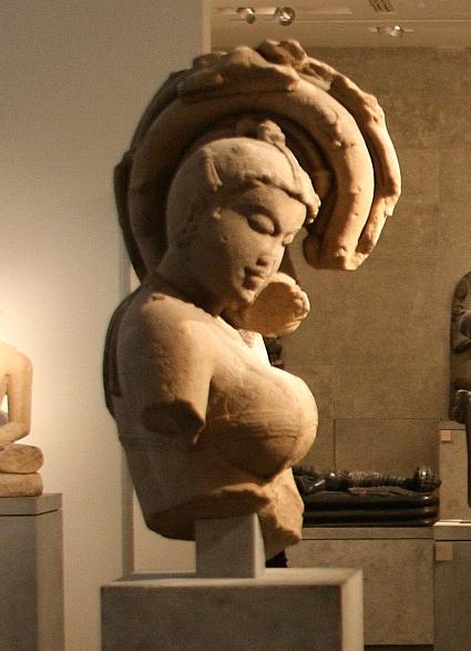 mg07_100112451_j_ca.jpg - Female bust with foliage, Madhya Pradesh or Rajasthan, medieval period, 10th-11th century, sandstone