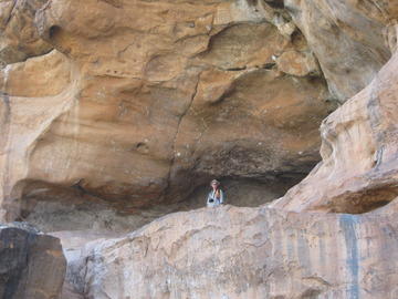 Tourist in Buddhist cave