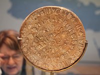 The Phaestos disk, from the early 17th c. BCE, is written in characters which have not yet been deciperhed. One more linguist is giving it a try.  gr16 091810342 j