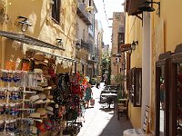 A narrow and commercial street in the old town.  gr16 092413031 j