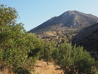 Ancient Mikenes lies on the hilltop in the middle of the picture, hidden by higher surrounging hills.  gr17 091508210 k