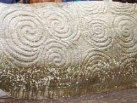 Megalithic rock carvings on entrance stone  Newgrange
