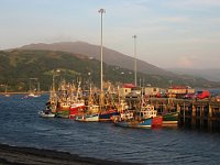 Fishing boats in the port of Ullapool at sunset  Scottish HIghlands, August 2004