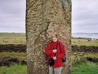 Tourist and standing stone at the Ring of Brodgar  Scottish HIghlands, August 2004