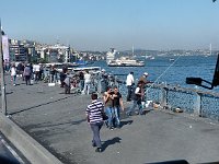 Istanbul - bus tour  Crossing the Galata Bridge, where there are always men fishing, with a view of the Bosphorus to the right.