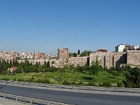 Istanbul - bus tour  Along the wall of Theodosius II are many towers. In between the wall and the road are gardens.