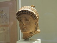 A clay head of Athena from the beginning of the 5th c. BCE. Isn't she beautiful?  gr18 092010510 k