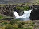 Hjálparfoss is interesting for its double falls and the rock formations around it.